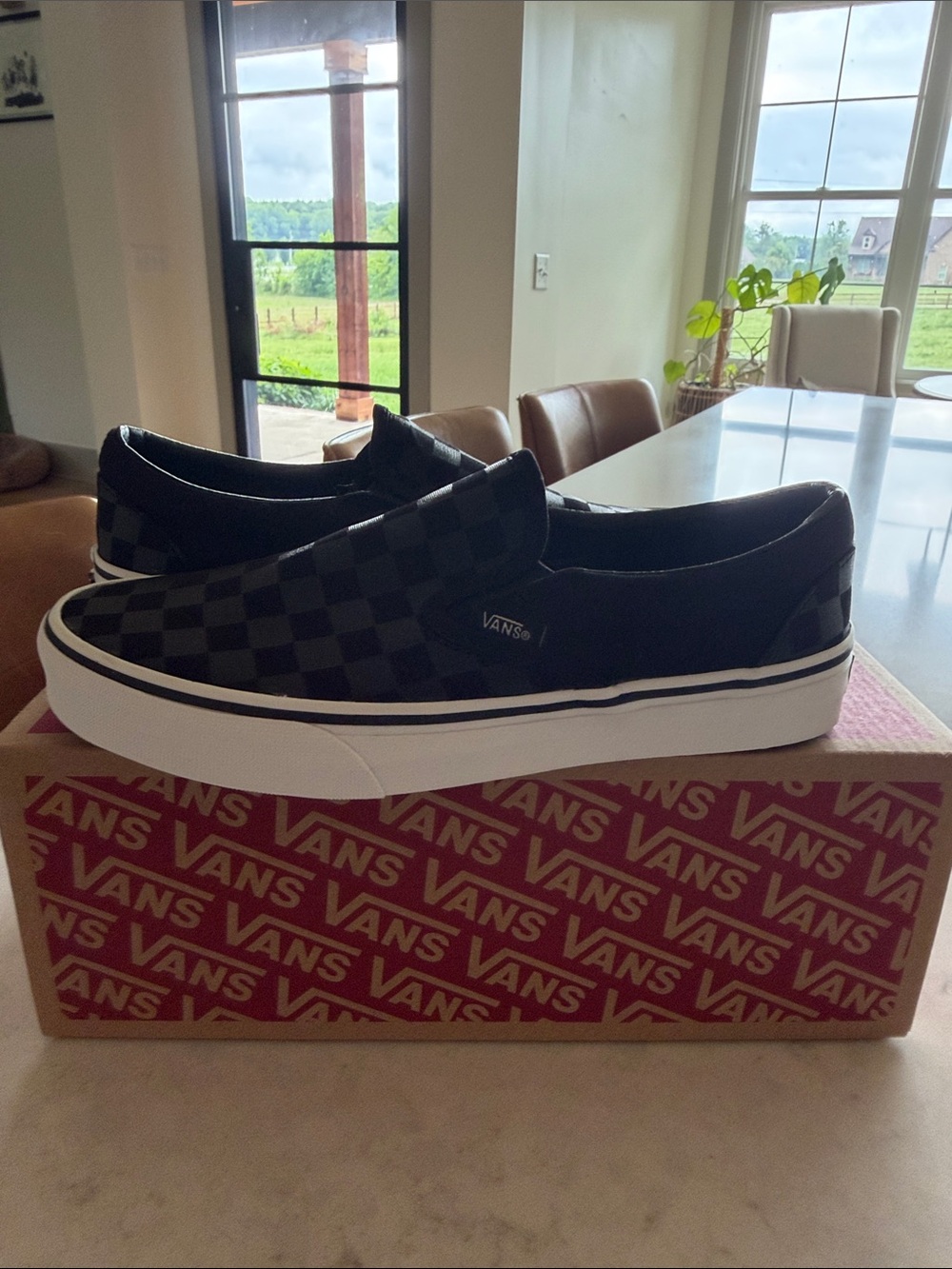 Vans Black & White Checkerboard Slip-On Sneakers